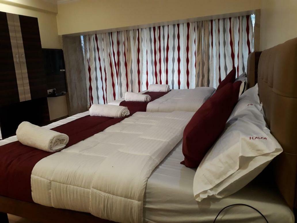 Hotel Alfa International Near Nanavati Hospital Mumbai Near Airport Mumbai Near Juhu Beach Экстерьер фото